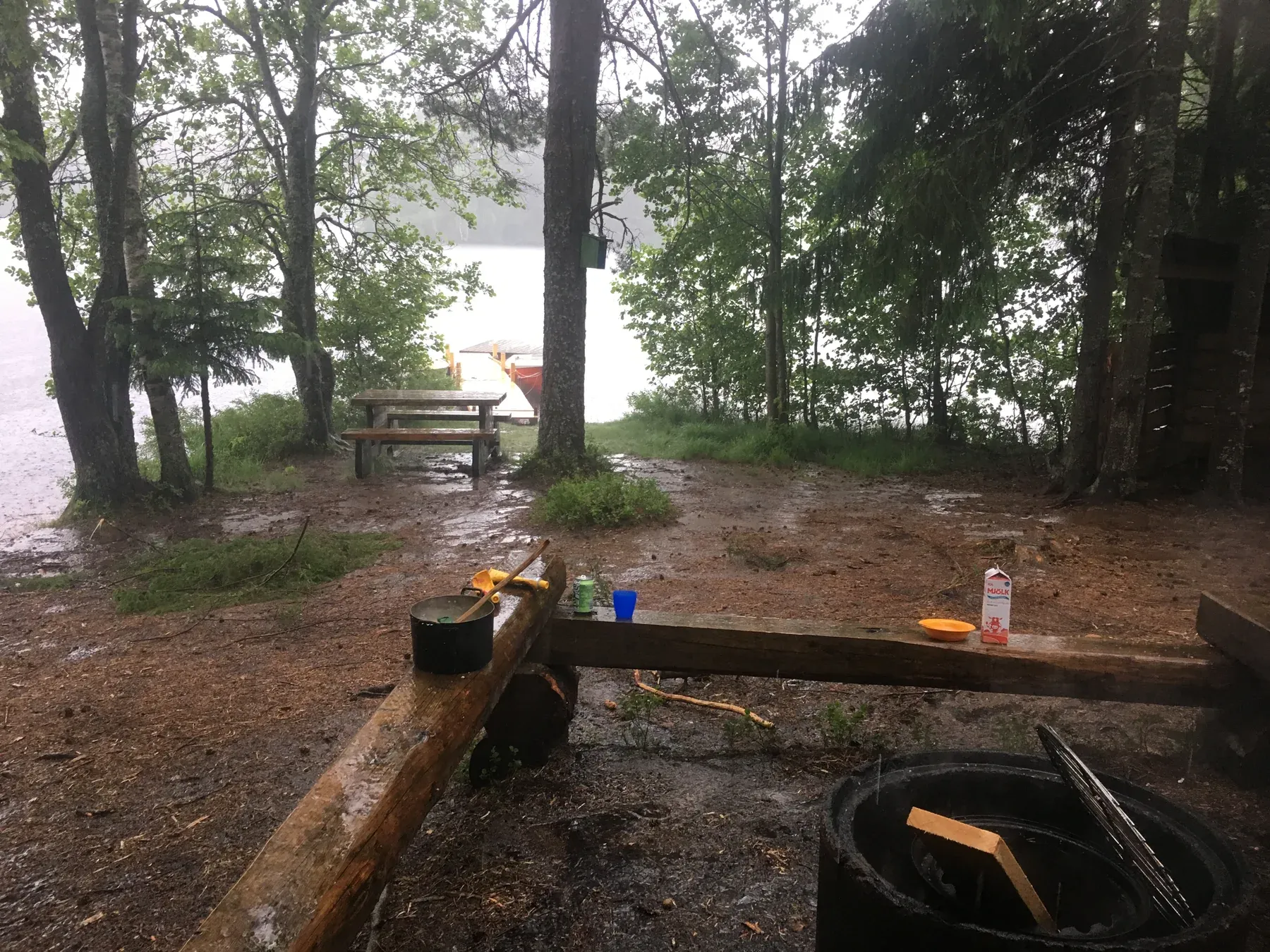 A campsite by a lake in the forest