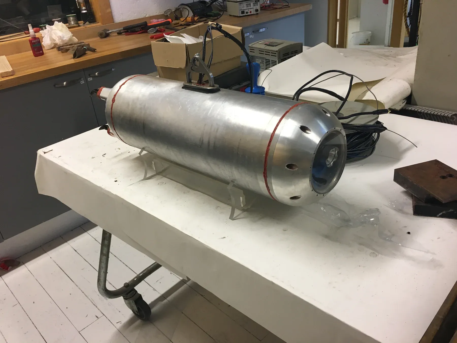 The home-built aluminium submarine on a workbench